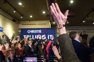 The owner of BeanTowne asks the audience to pose for a photo for social media. Photo by Anna Sortino. 